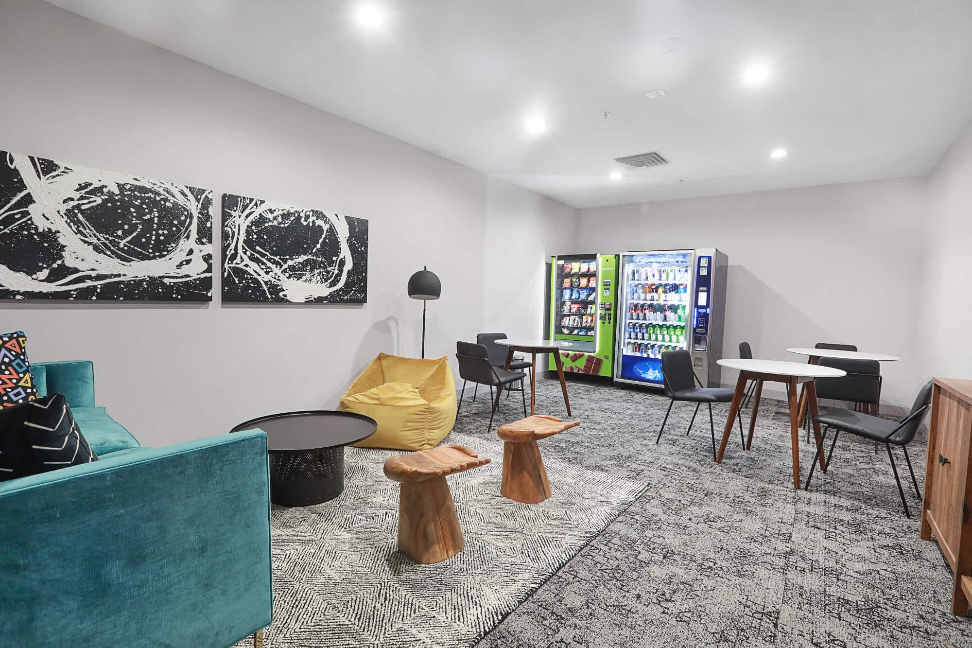 greene crossing off campus apartments near the university of south carolina clubhouse lounge seating area with vending snack machines