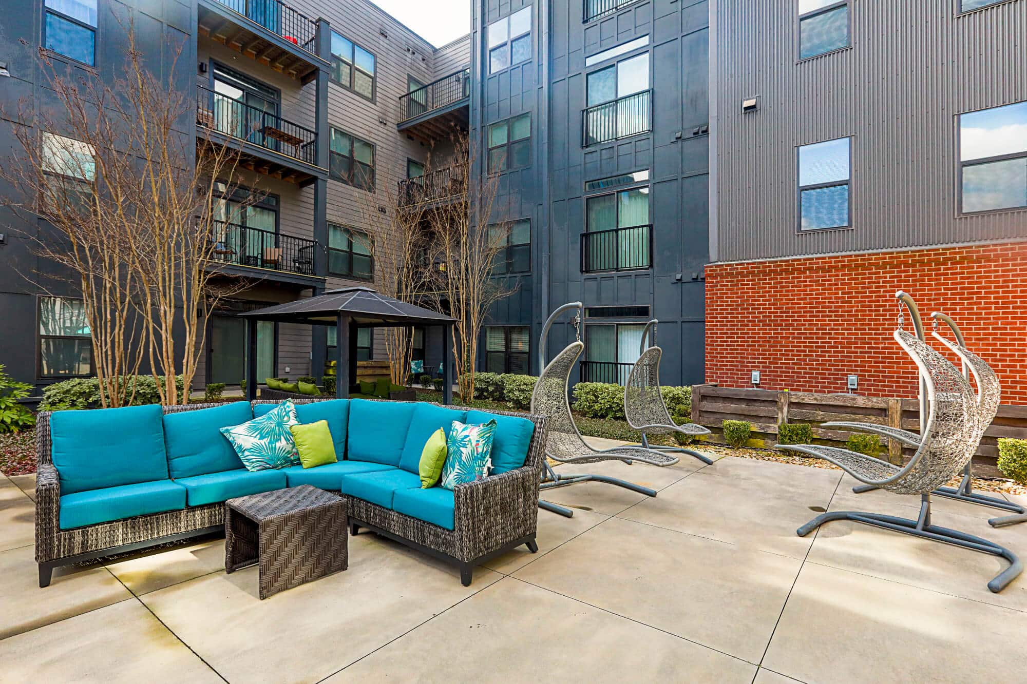 greene crossing off campus apartments near the university of south carolina hammock swing lounge and outdoor seating