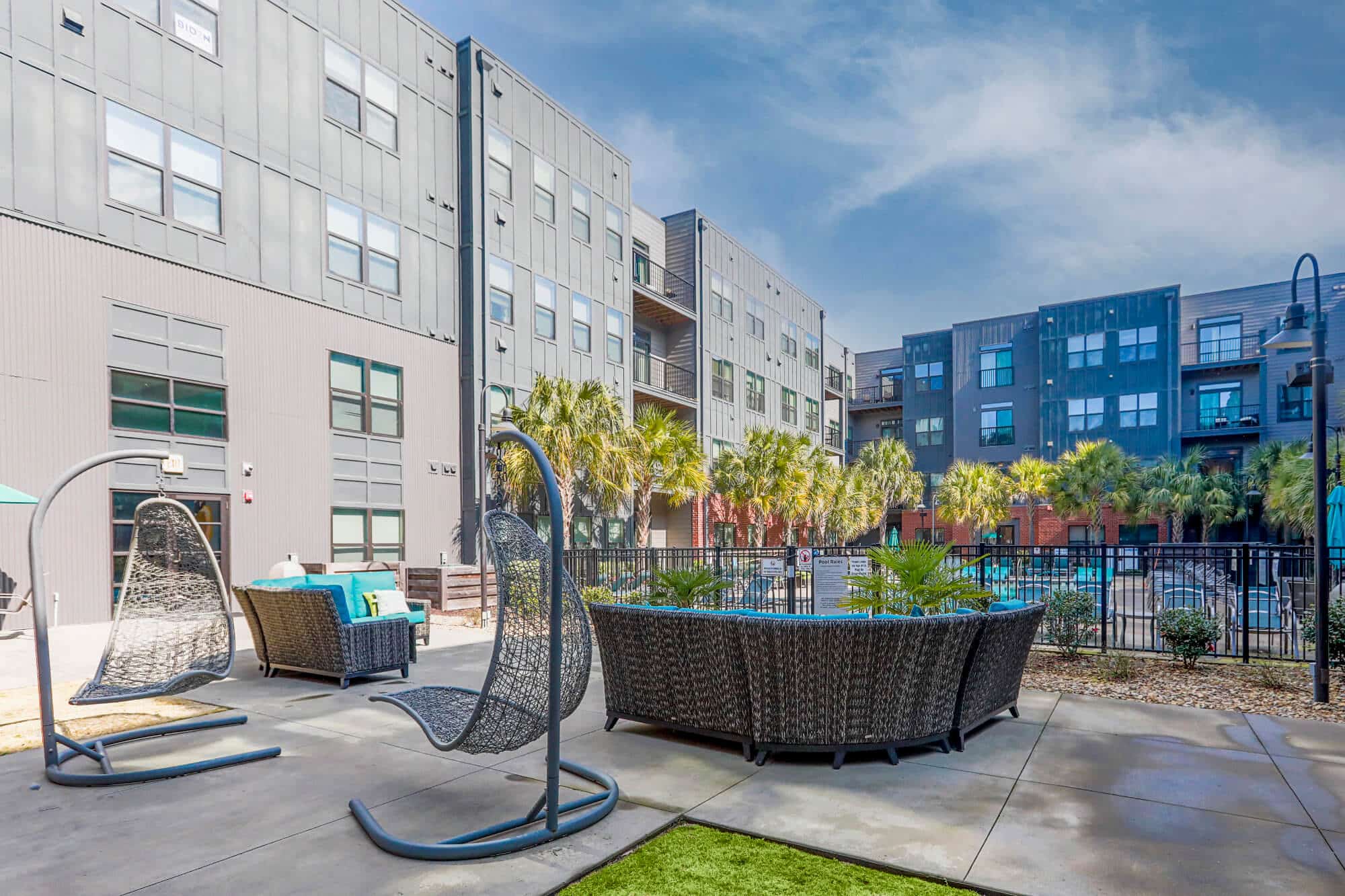 greene crossing off campus apartments near the university of south carolina poolside lounge outdoor hammock swing lounge